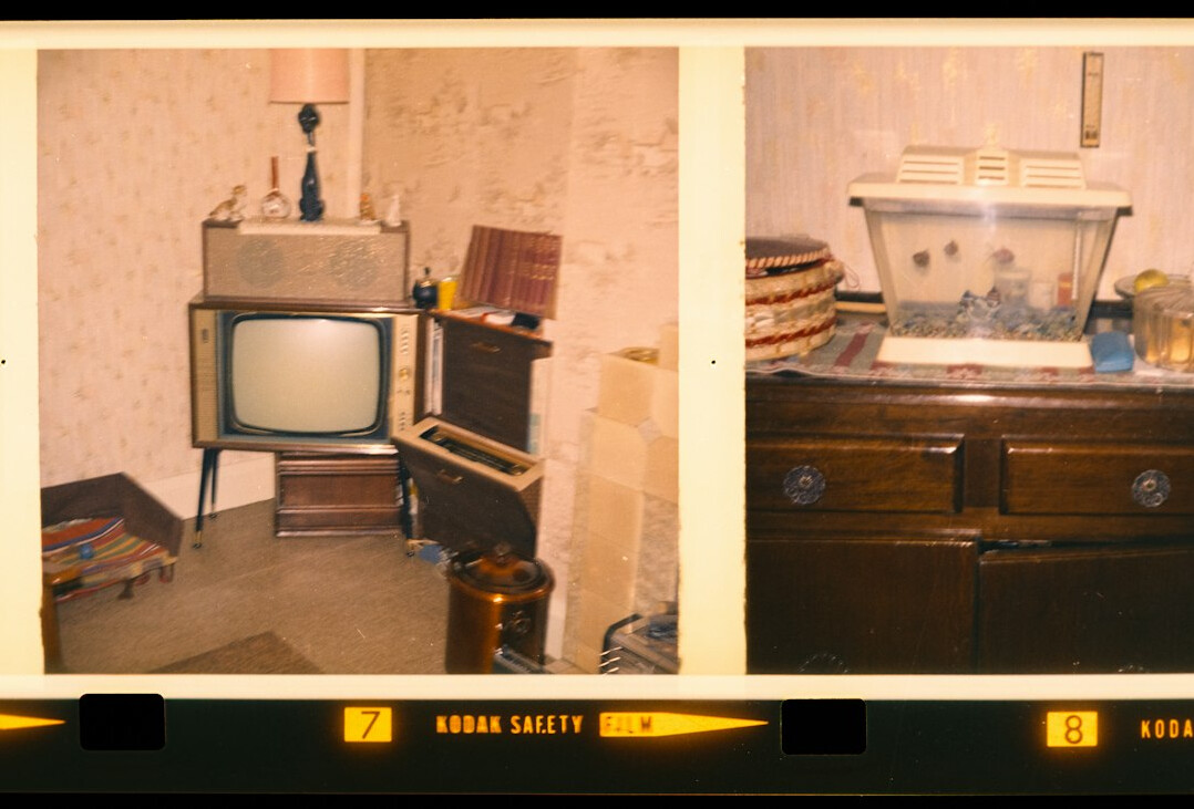 Television control room with multiple video monitors and a live switching console