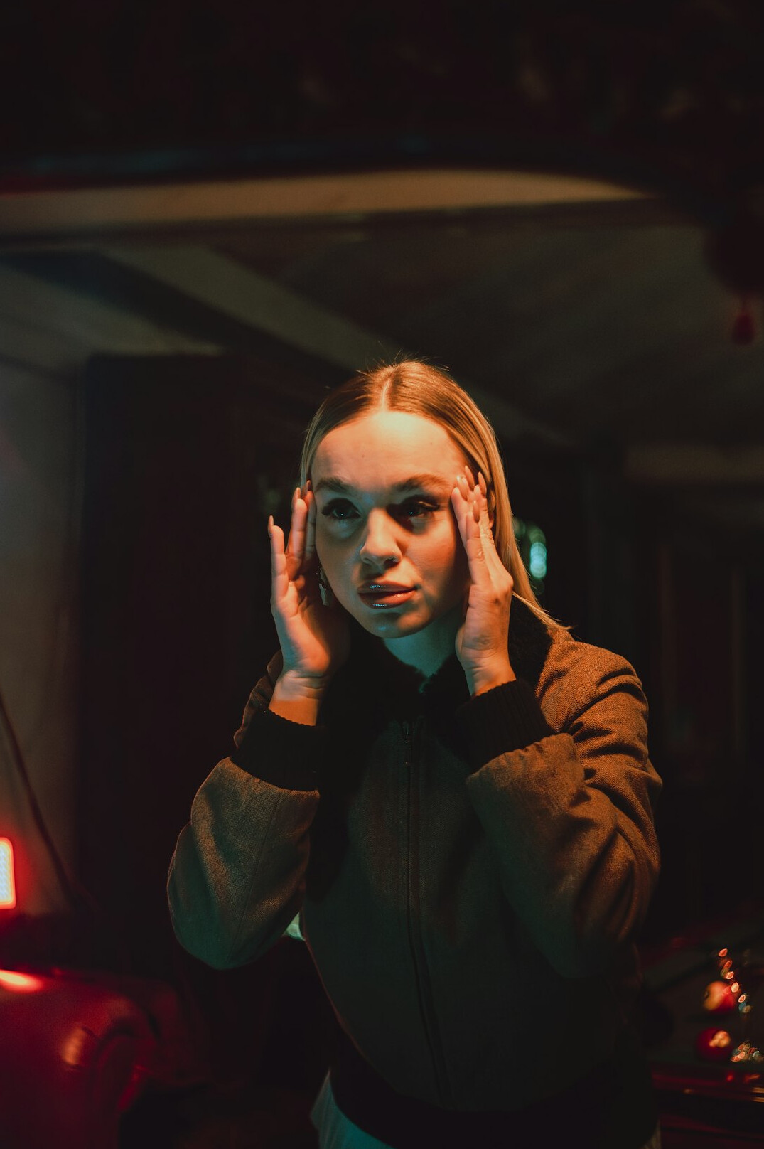 White woman instructor with headset in a television gallery