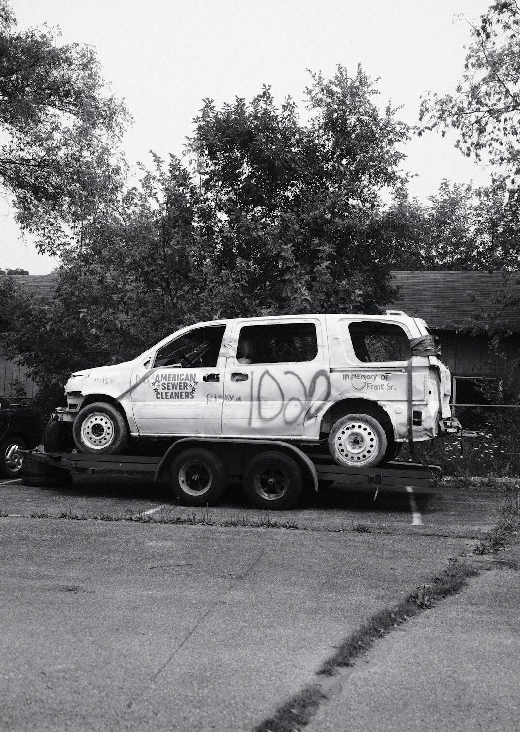 Outside broadcast van with satellite dish and cables for live production