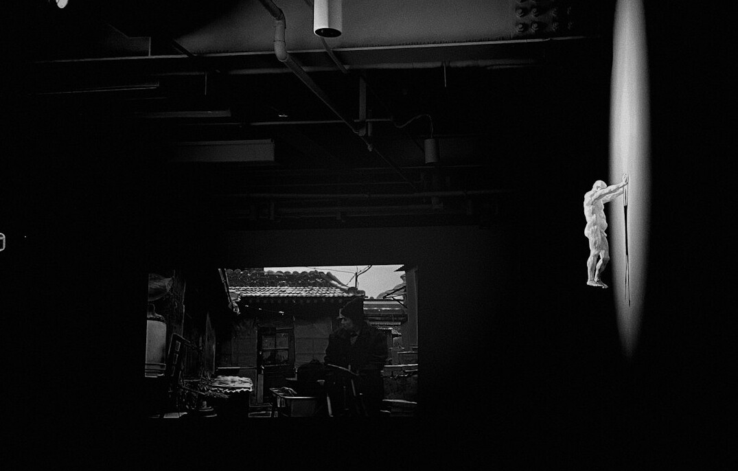 Live television studio set with cameras and bright lighting rig